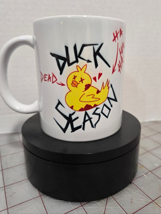 Mug with a cartoon design and text on a white background